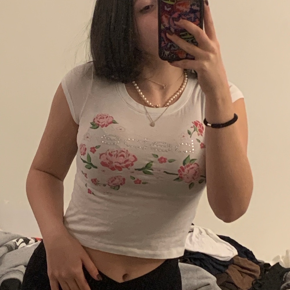 white floral bebe rhinestone crop tee